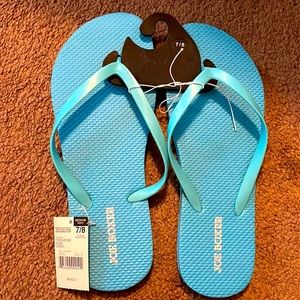 Never worn flip flops size 7/8